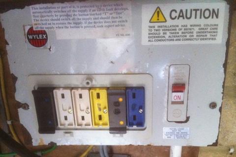 An old Wylex fuse board in need of replacement.